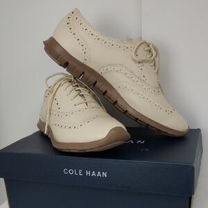 Cole Haan Cream Wingtip Sneakers with Brown Sole